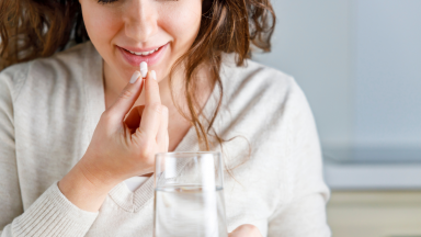 woman taking vitamins